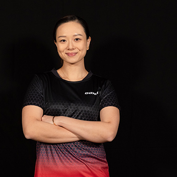 Yuan Wan im Spider Trikot