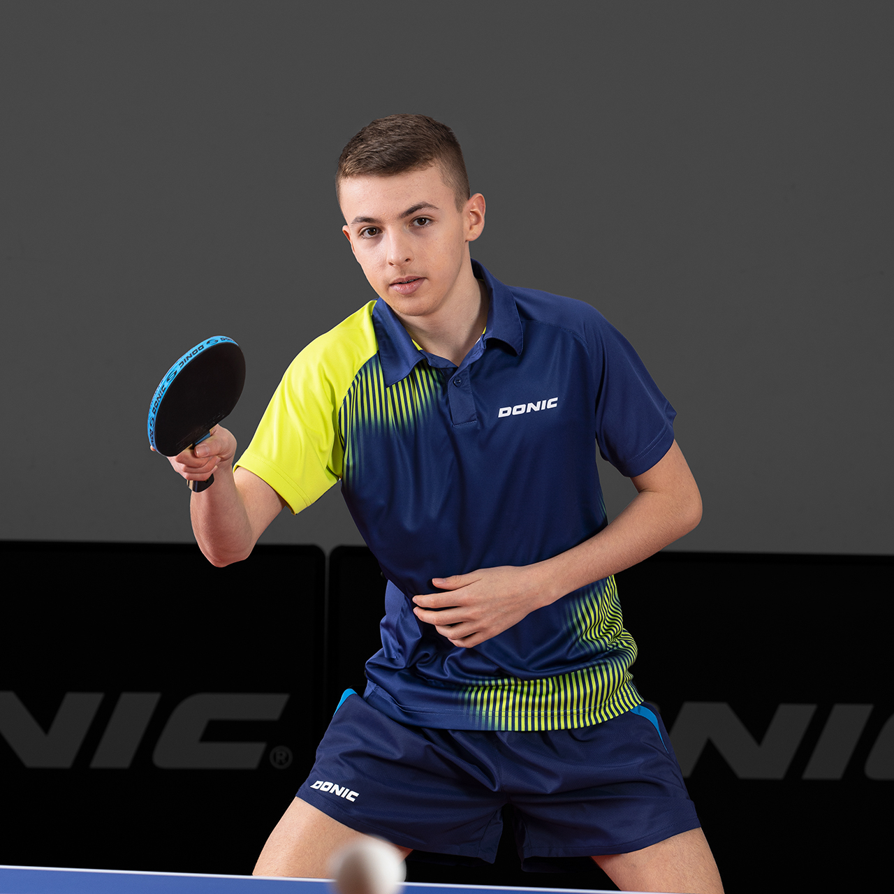 donic-polo_caliber_navy_lime-player-web DONIC Poloshirt Caliber marine/cyan player