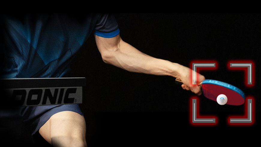 Table tennis racket with inclined angle when hitting the ball